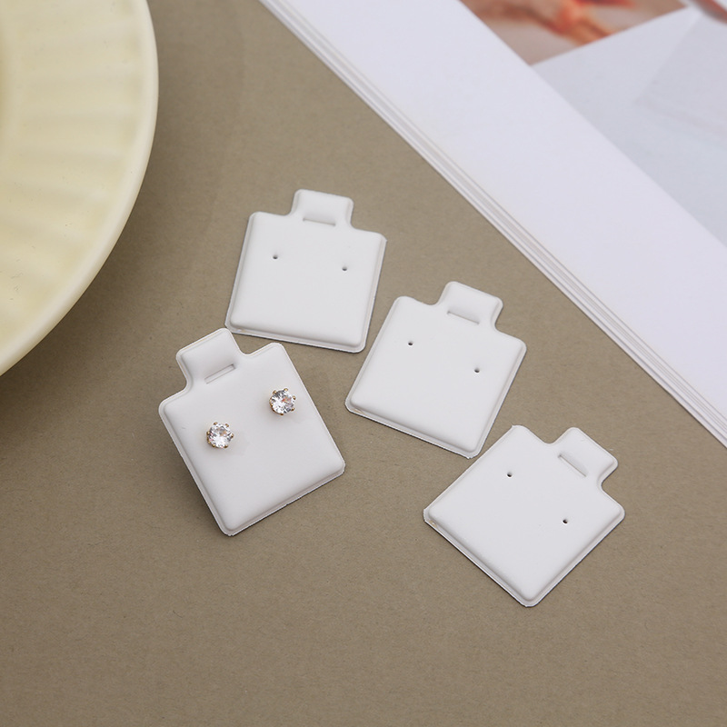 100Pcs White Earring Display C - مراجعة Body Jewelry Display وسعره