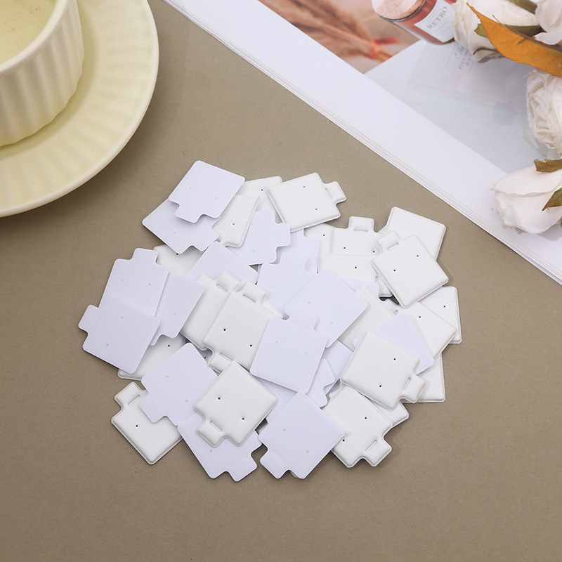 100Pcs White Earring Display C - مراجعة Body Jewelry Display وسعره