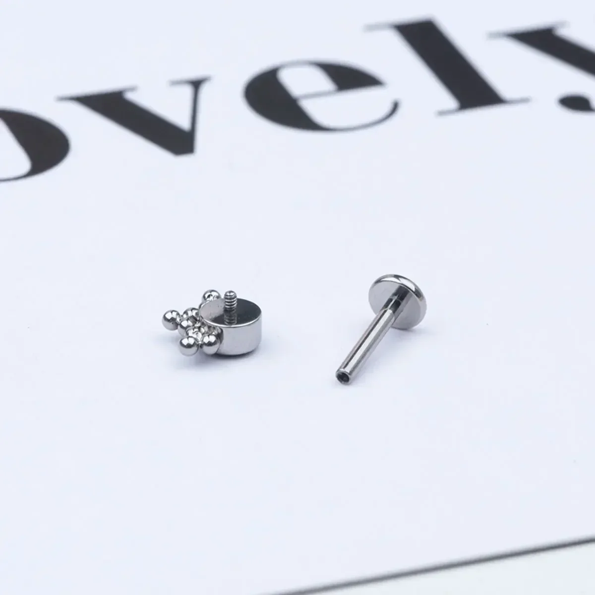 G23 ASTM F136 Implant Grade Ti - مراجعة Body Jewelry Implant Grade وسعره