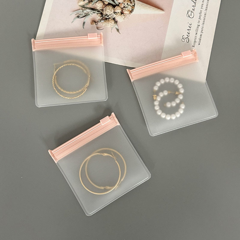50pcs Pink Zipper Jewelry Pouc - مراجعة Body Jewelry Display وسعره